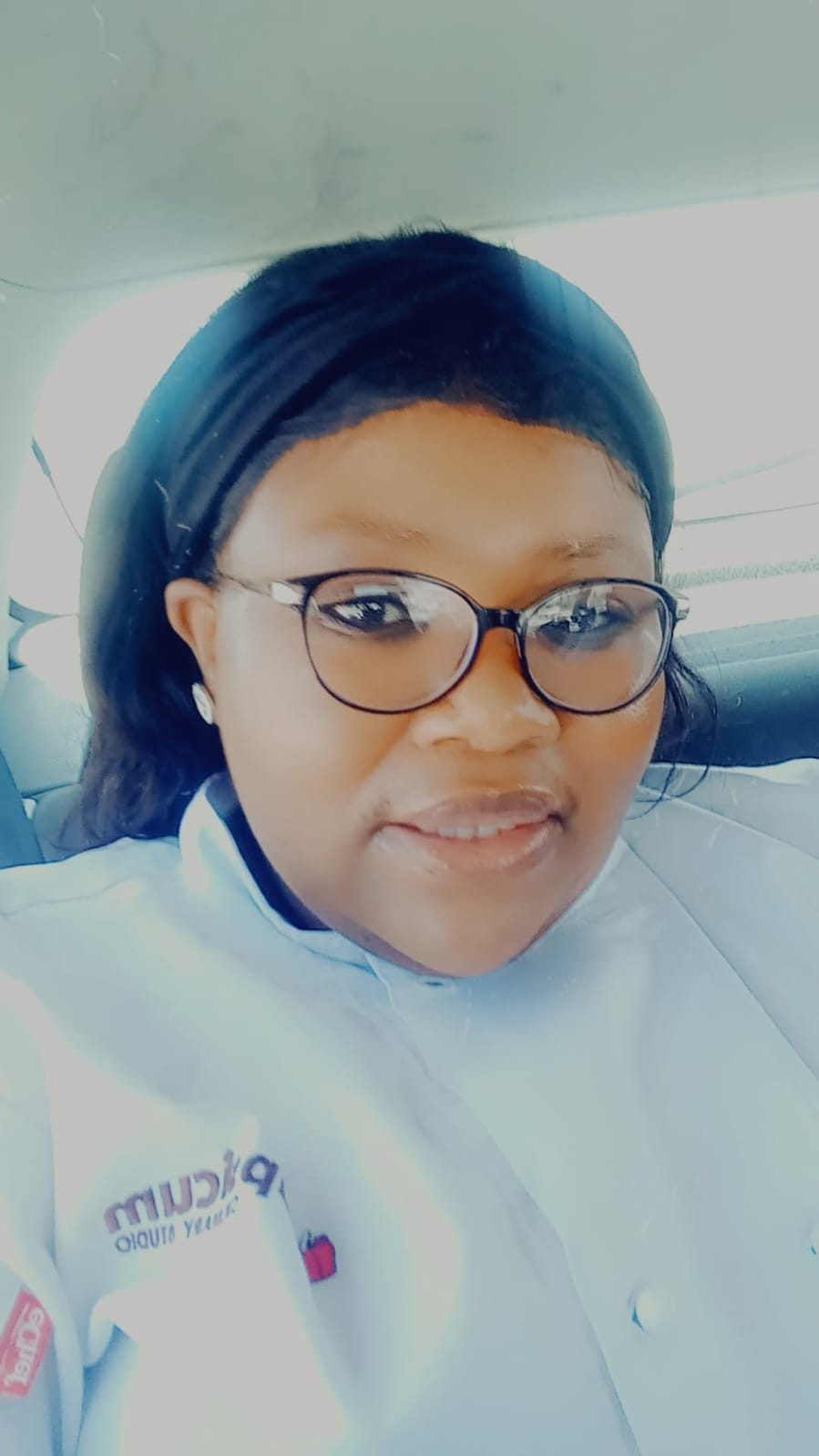 Chef Amanda Ibezim in her chef whites — Head Chef and professional Pâtissier