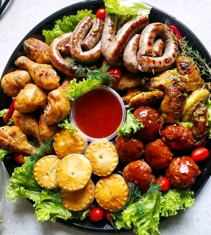 Mixed grill party platter with dipping sauce